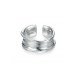 Wide silver-colored creased open ring on a white background, showing layered ridges, recessed grooves, separated ends, and an S925 stamp inside.